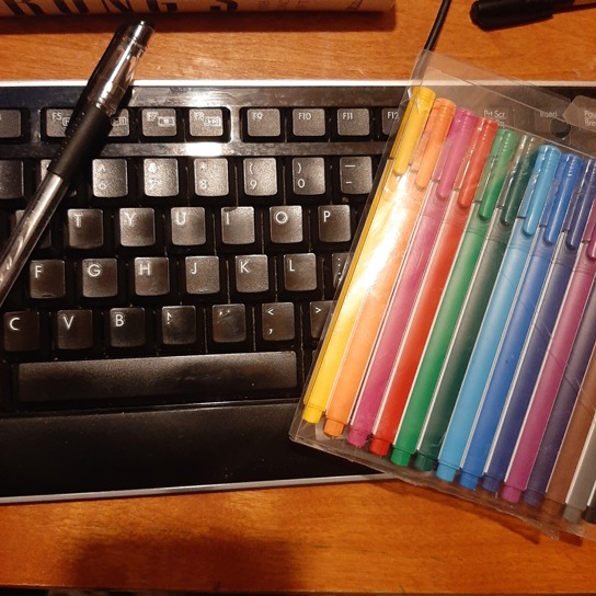 Keyboard and Pen and Markers